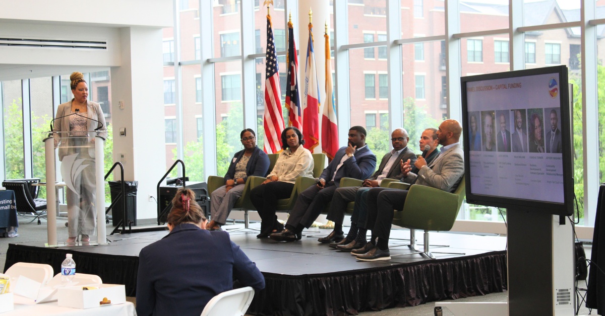 panel of people on stage